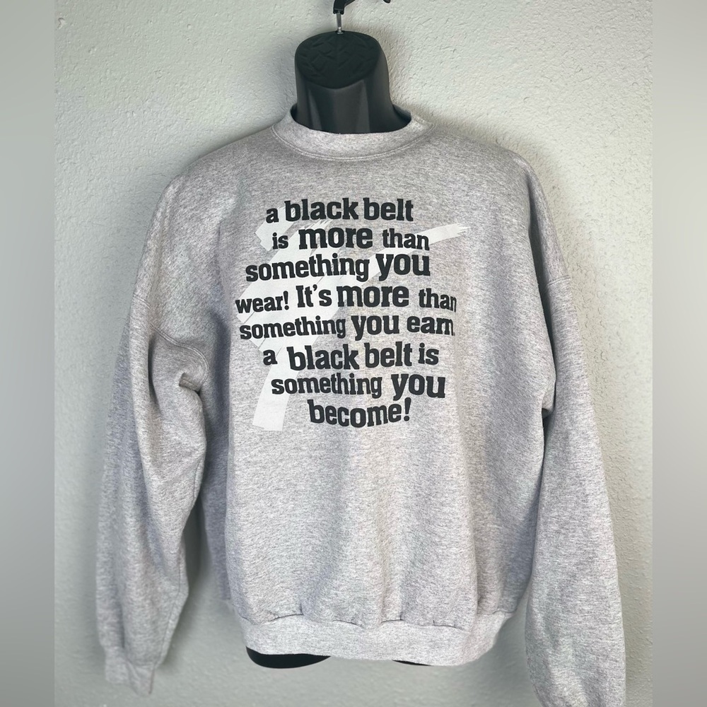 Vintage martial arts themed sweatshirt.